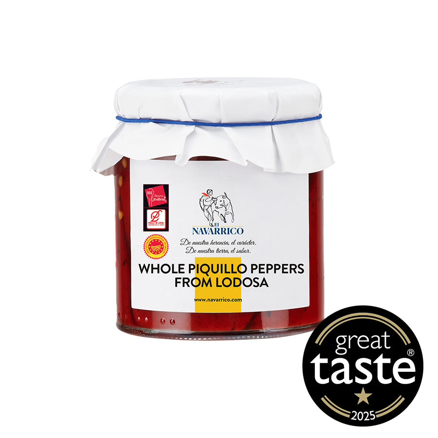 Jar of whole piquillo peppers from Lodosa with Navarrico branding and Great Taste award on a white background