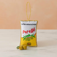 Decorative oil pouch with 'Perello' branding on a light background