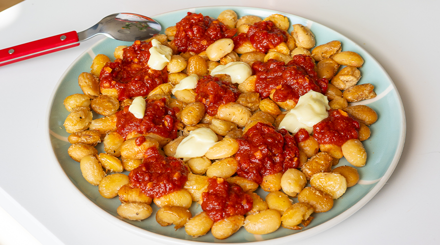 butterbean bravas with Perelló salsa brava-style sauce and dolops of alioli