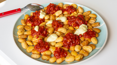 butterbean bravas with Perelló salsa brava-style sauce and dolops of alioli