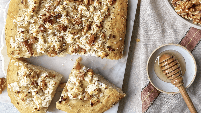 coca bread with goat curd cheese, orange and orange honey blossom