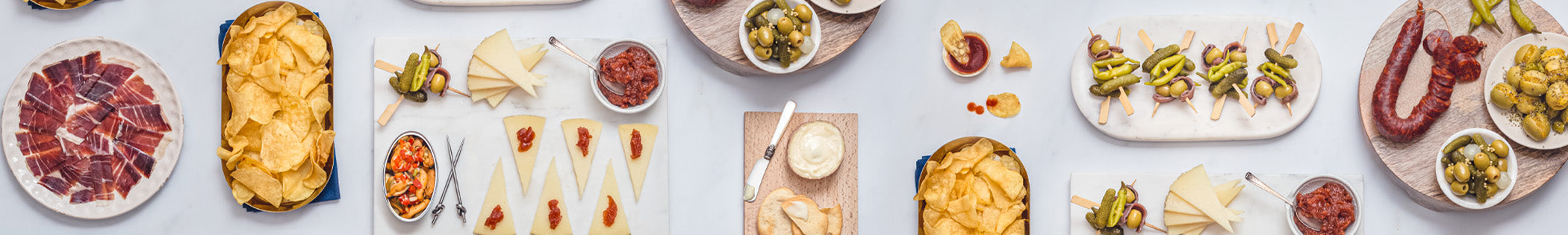 table full of different Spanish tapas 