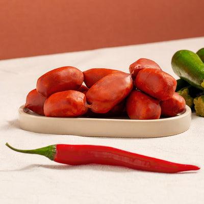 brindisa mini chorizos in a tray, courgettes and a chilly pepper