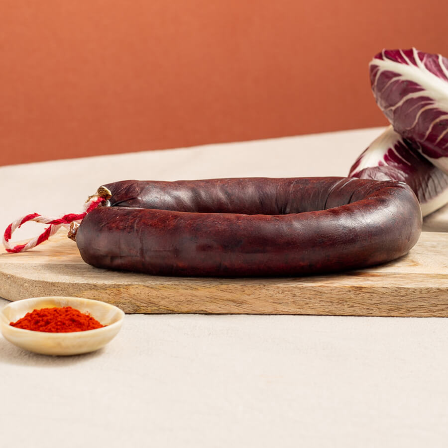 Morcilla achorizada, acorn fed iberian black pudding with paprika and two red chicories 