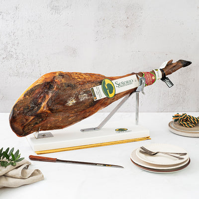 senorio iberico ham leg on a ham stand 