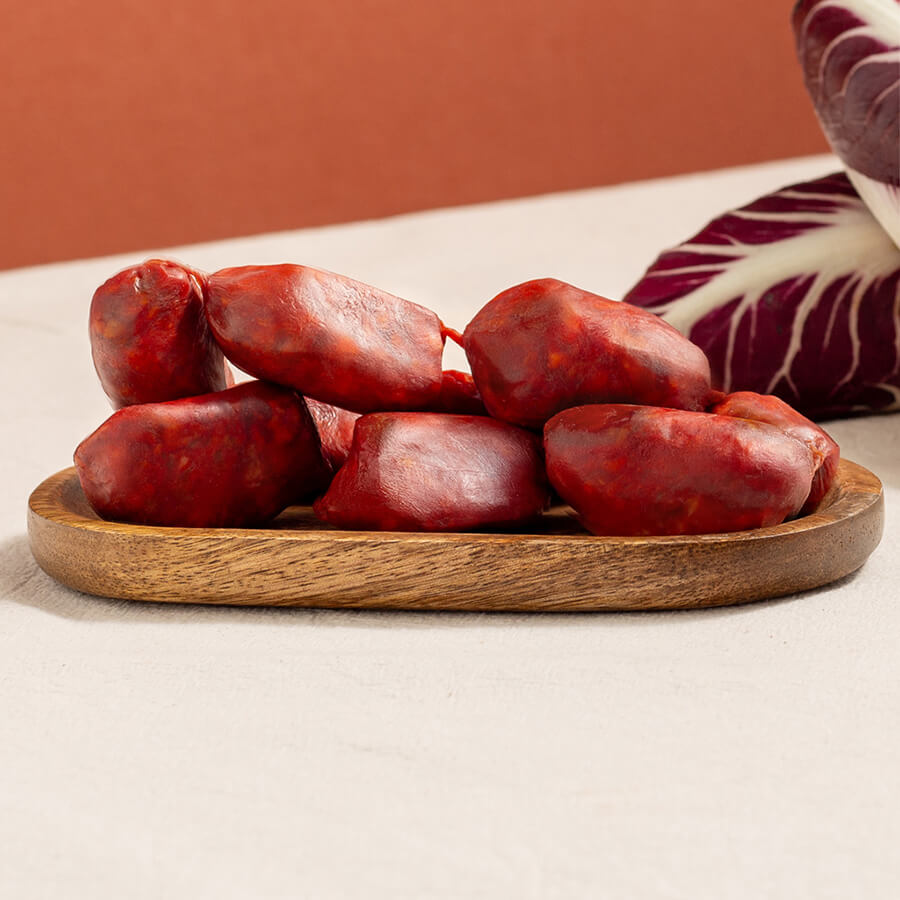 brindisa mini chorizos in a tray and red chicory