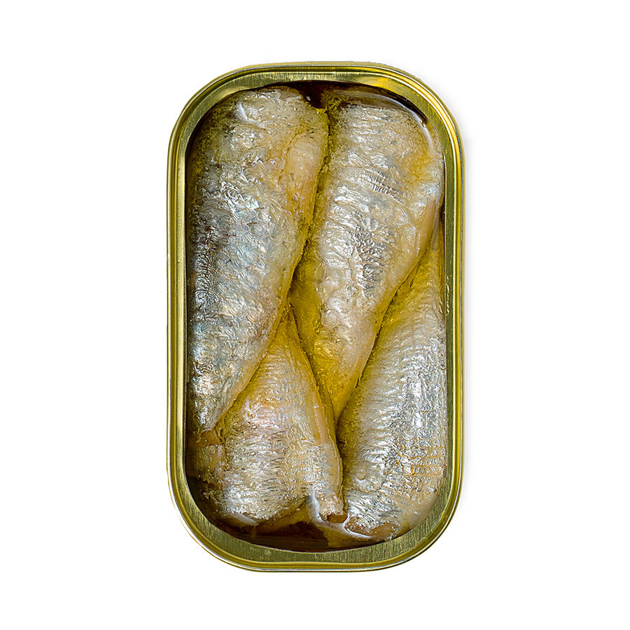 Can of pickled fish on a white background