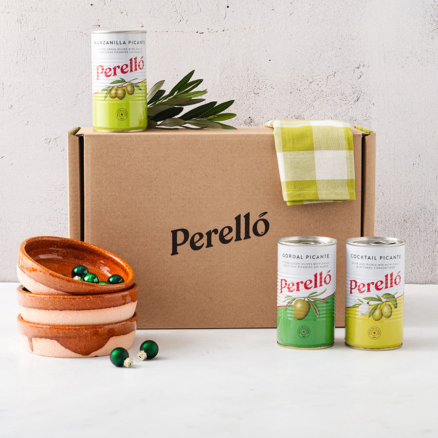 perello olive trio selection tins and three pereruela dishes gift box decorated with Christmas decorations 