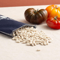 LE27303 Brindisa epic alubia beans cloth sack and three tomatoes spanish foods