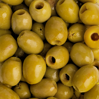 Close-up of green olives with a focus on texture and color.