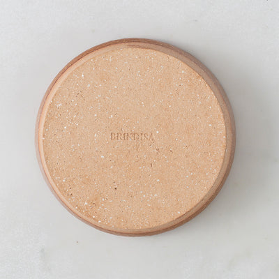 The Pereruella tapas dish bottom with the Brindisa wordmark