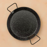 a paella pan on a natura coloured BG