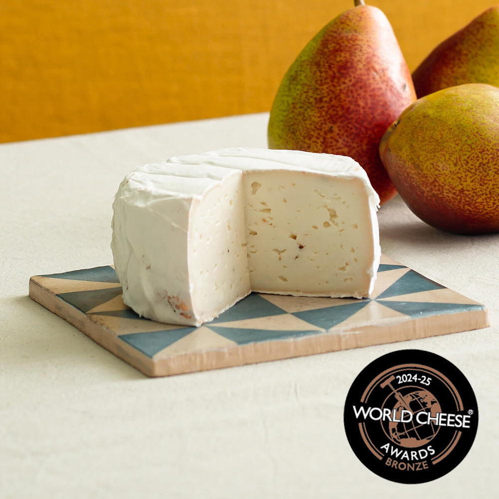 Pastura with truffle with the bronze world cheese award logo