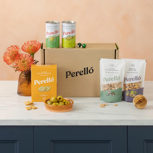 Perello brand products including cans, boxes, and packaging on a table with a neutral background